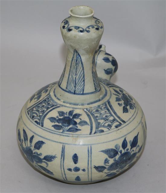 An Annamese blue and white porcelain kendi, 15th century, 23cm, sea-etched glaze